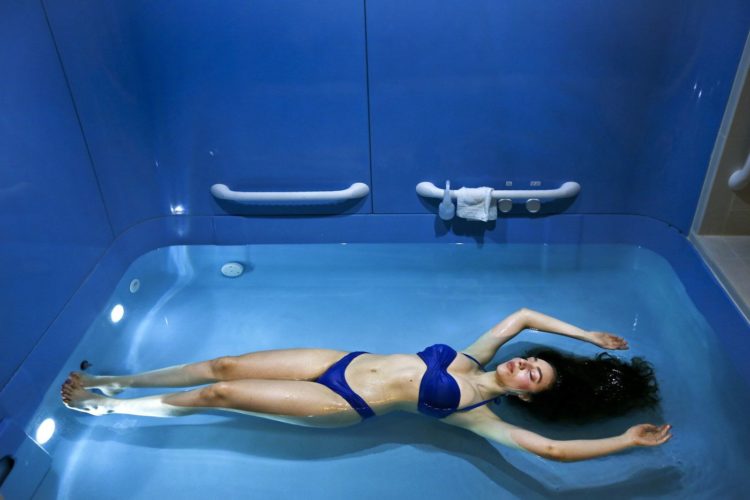 woman in float therapy pool